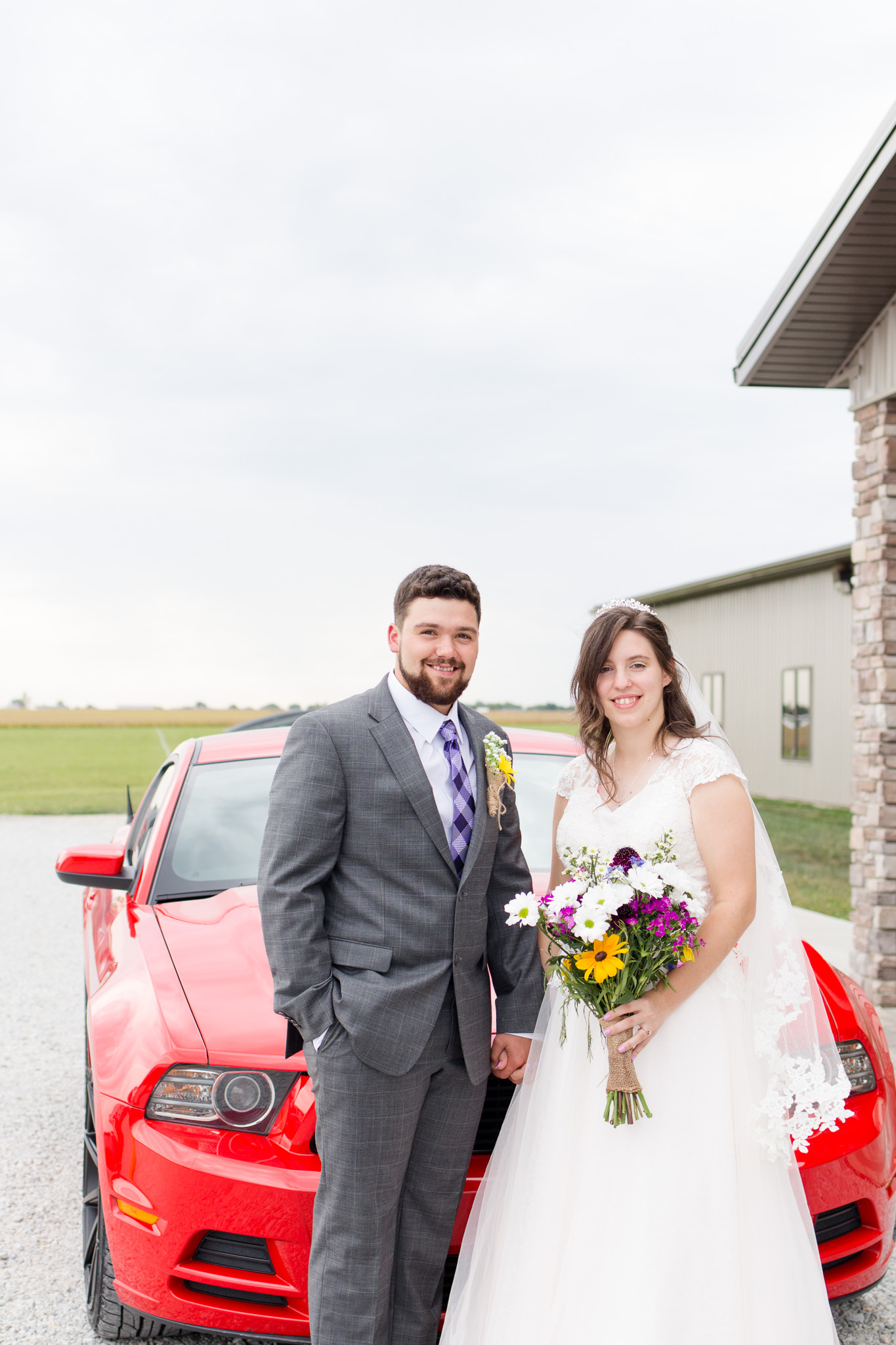 Bride and groom Ford Mustang get away car