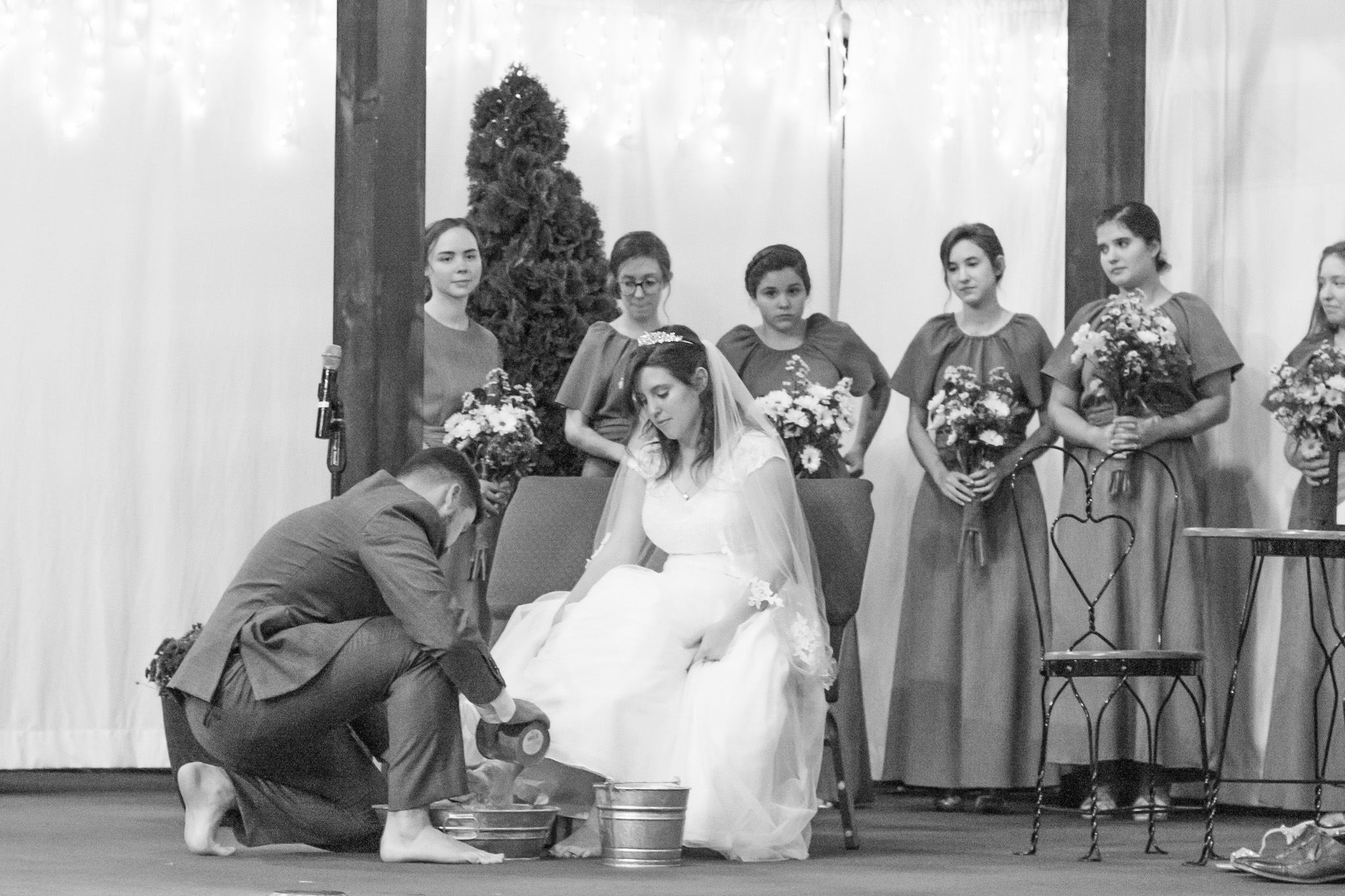 Wedding bride and groom foot washing ceremony